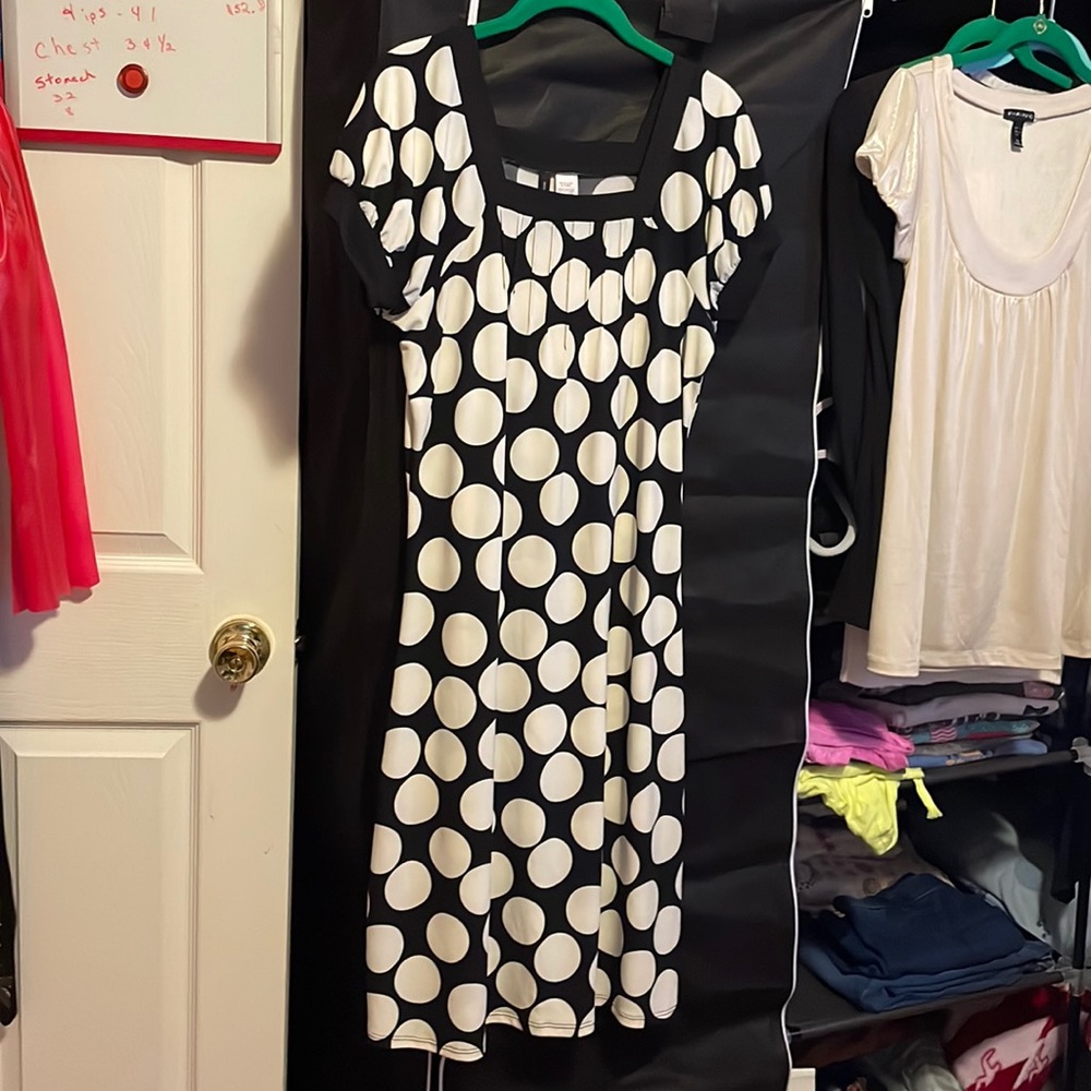 Nice used black dress With big white polkadots